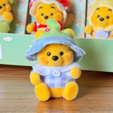 Winnie touching garden flocked figure - open box